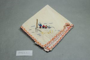 Image of Figures standing on dock holding flags with the work "Hurrah!" below, one of a set of 3 embroidered napkins, each with different scene and title